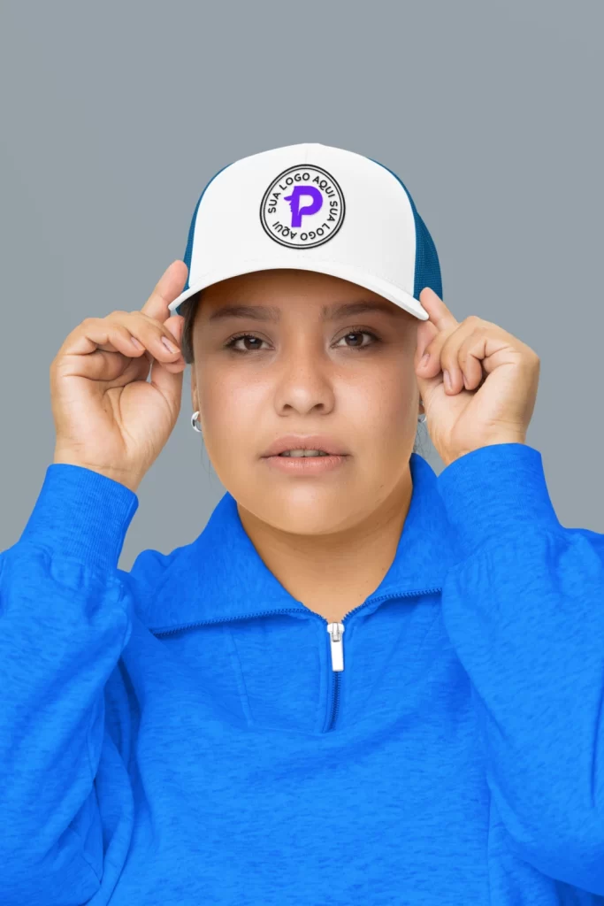 mockup featuring a woman wearing a trucker hat in a studio m34568 50 percent