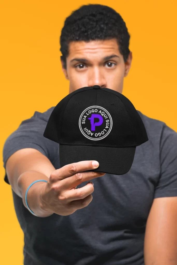 mockup of a man showing off his dad hat in a studio 27046 50 percent